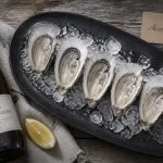 Vin blanc pour huitre, huîtres sur glace avec Muscadet très frais